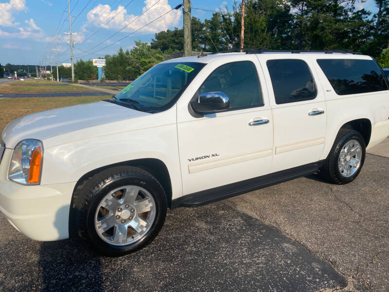 2010 GMC Yukon XL for sale at TOP OF THE LINE AUTO SALES in Fayetteville NC