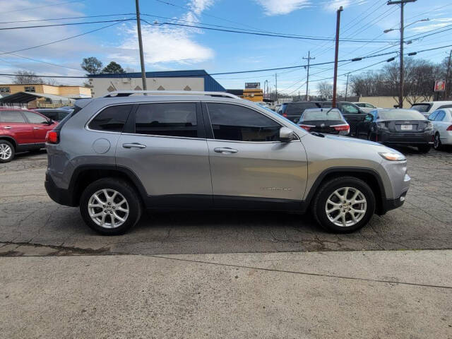 2015 Jeep Cherokee for sale at DAGO'S AUTO SALES LLC in Dalton, GA