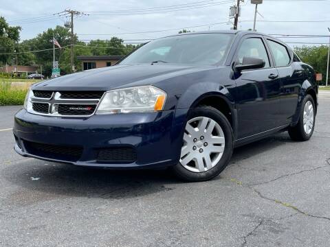 2014 Dodge Avenger for sale at MAGIC AUTO SALES in Little Ferry NJ