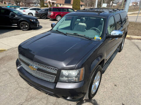 2011 Chevrolet Suburban for sale at 1 Price Auto in Mount Clemens MI