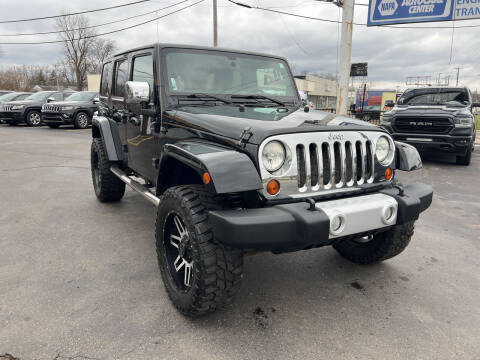 2011 Jeep Wrangler Unlimited for sale at Summit Palace Auto in Waterford MI