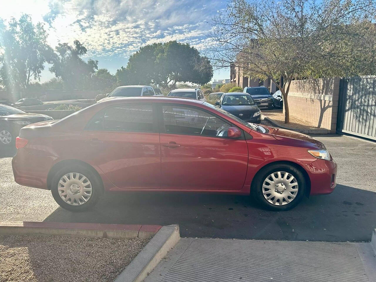 2013 Toyota Corolla for sale at HUDSONS AUTOS in Gilbert, AZ