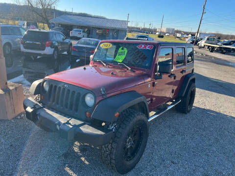 2013 Jeep Wrangler Unlimited for sale at Mike's Auto Sales in Wheelersburg OH