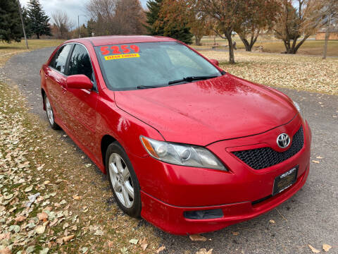 2009 Toyota Camry for sale at BELOW BOOK AUTO SALES in Idaho Falls ID