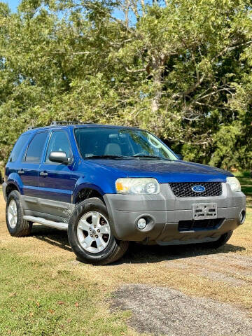 2007 Ford Escape for sale at Vision Auto Group in Sugar Land TX