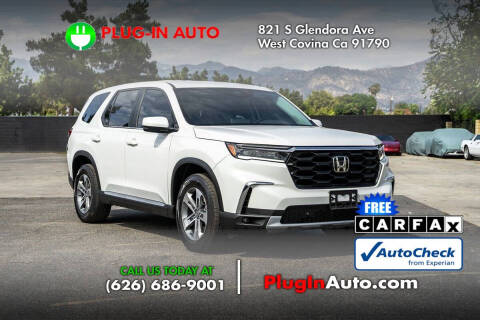 2023 Honda Pilot EX-L w/Rear Captain's Chairs