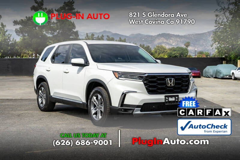 2023 Honda Pilot EX-L w/Rear Captain's Chairs