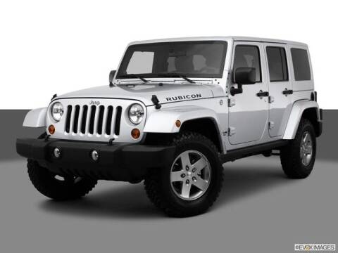 2012 Jeep Wrangler Unlimited for sale at Everyone's Financed At Borgman - BORGMAN OF HOLLAND LLC in Holland MI