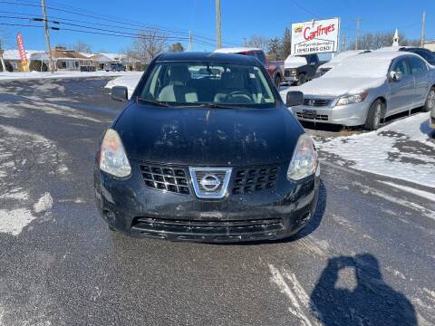 2009 Nissan Rogue for sale at Homeland Motors INC in Winchester VA
