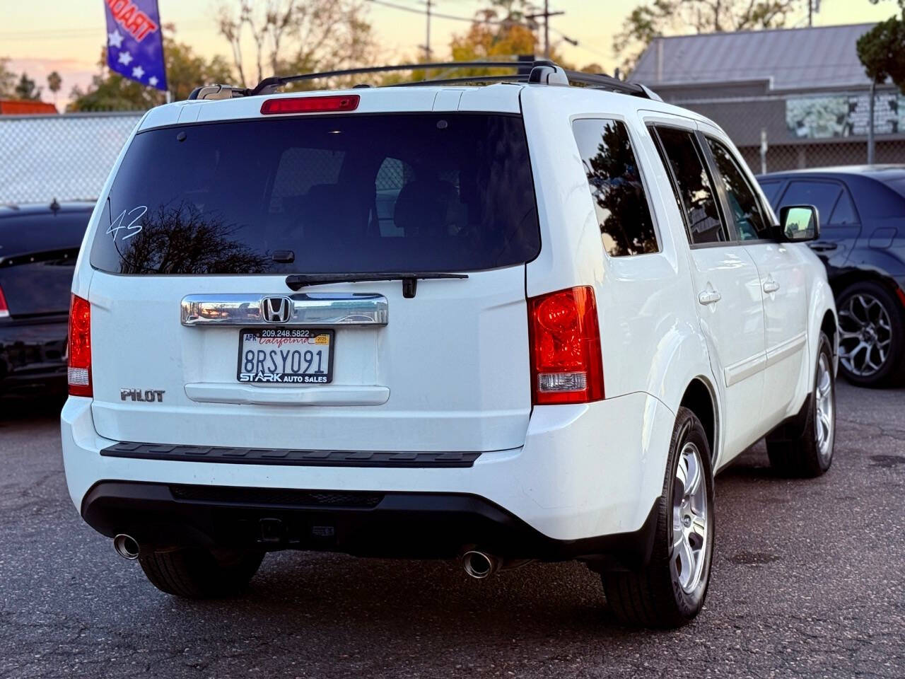 2013 Honda Pilot for sale at STARK AUTO SALES INC in Modesto, CA