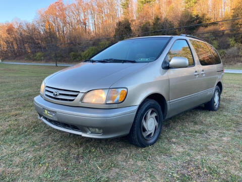 2003 Toyota Sienna for sale at Used Cars Station LLC in Manchester MD