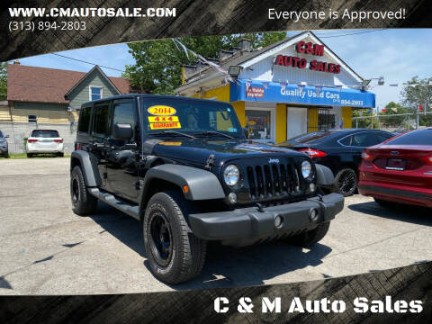 2014 Jeep Wrangler Unlimited for sale at C & M Auto Sales in Detroit MI