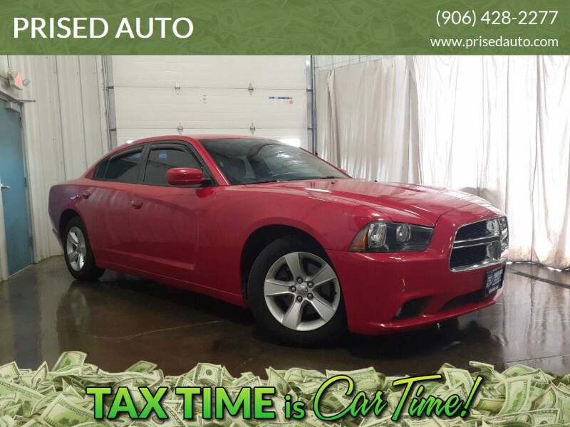 2013 Dodge Charger for sale at PRISED AUTO in Gladstone MI
