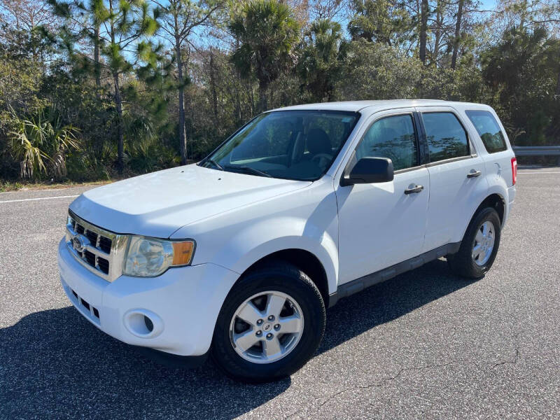 2009 Ford Escape for sale at VICTORY LANE AUTO SALES in Port Richey FL