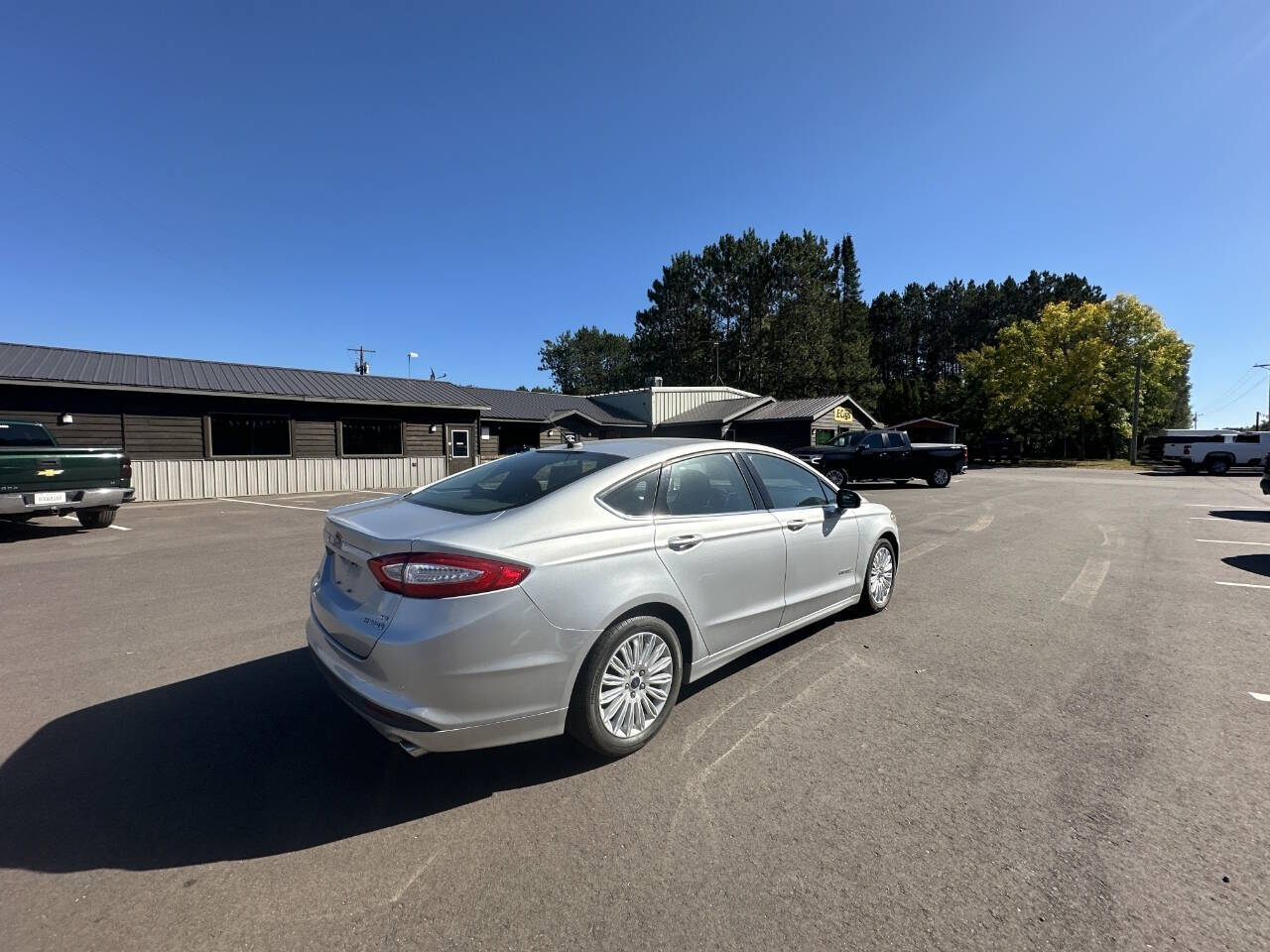 2016 Ford Fusion Hybrid for sale at Auto Hunter in Webster, WI