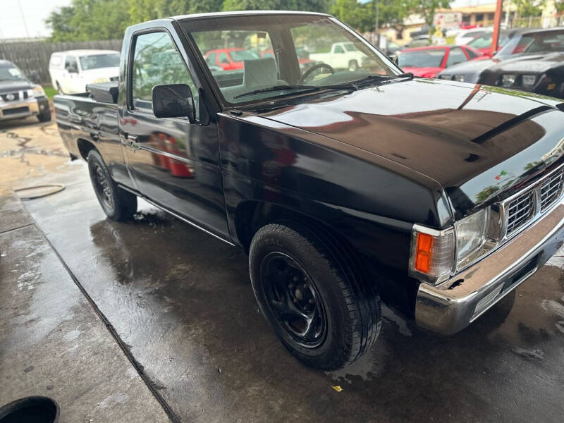 1996 Nissan Pickup for sale at Buy-Fast Autos in Houston TX