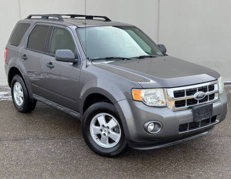 2010 Ford Escape for sale at DISTINCT AUTO GROUP LLC in Kent OH