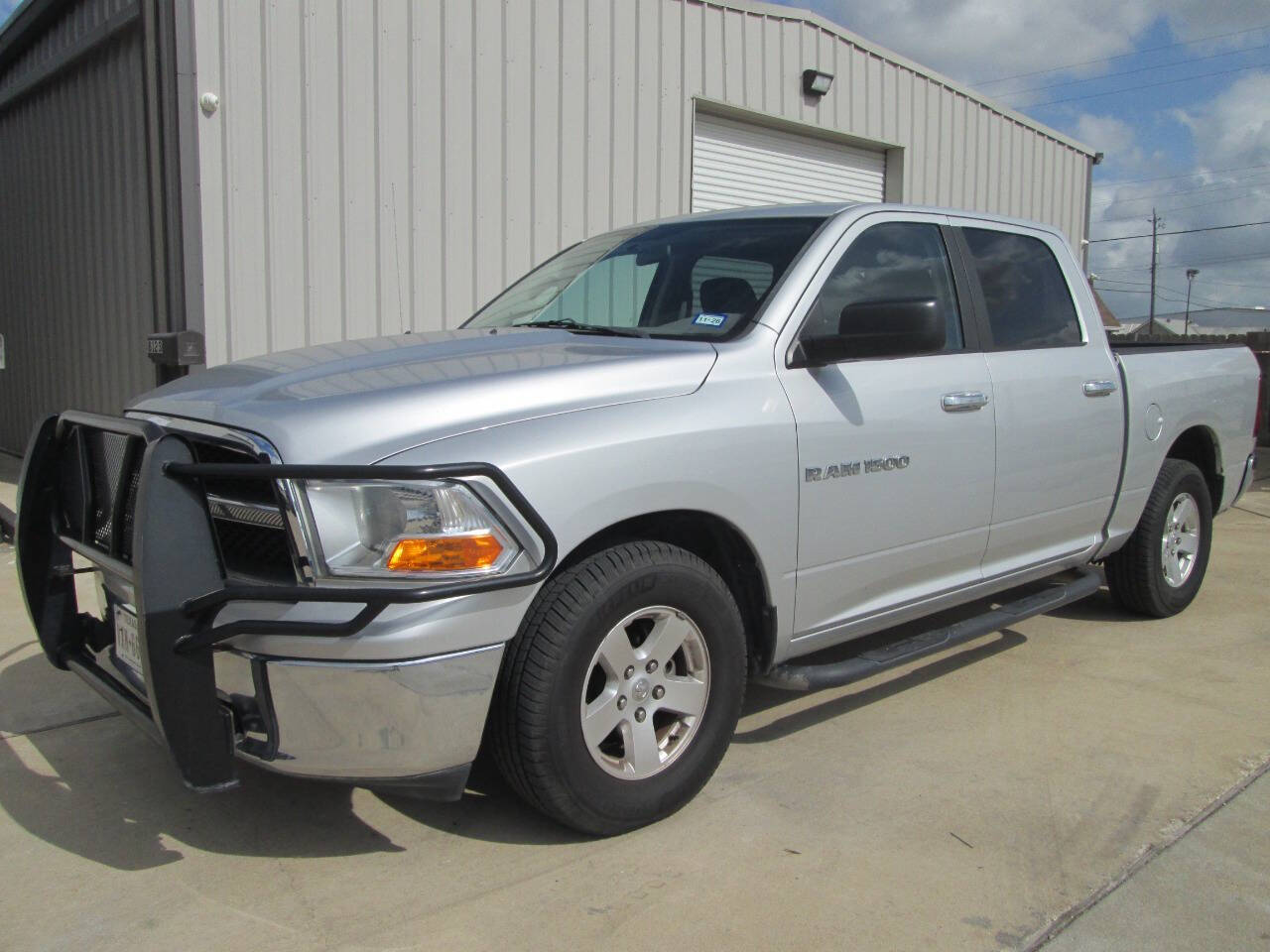 Silver 2011 Ram 1500 SLT 4x2 SLT 4dr Crew Cab 5.5 ft. SB Pickup 1