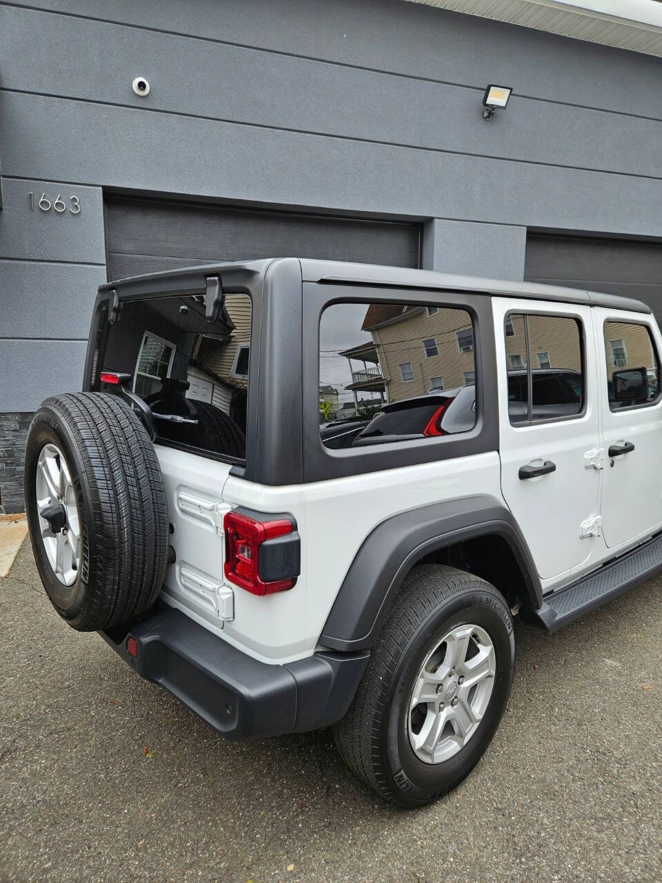 2019 Jeep Wrangler Unlimited for sale at RENOS AUTO SALES LLC in Waterbury, CT