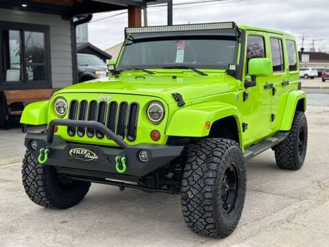 2012 Jeep Wrangler Unlimited for sale at Fesler Auto in Pendleton IN