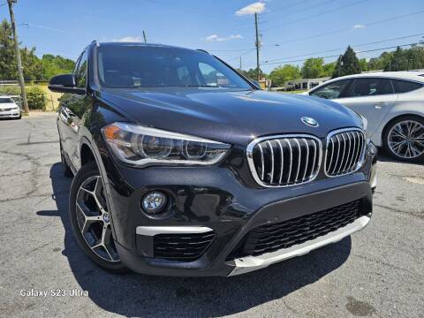 2017 BMW X1 for sale at North Georgia Auto Brokers in Snellville GA