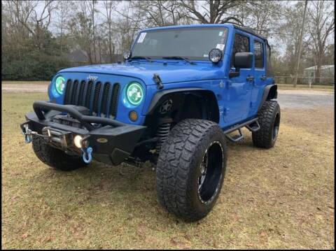 2011 Jeep Wrangler Unlimited for sale at Triple A Wholesale llc in Eight Mile AL