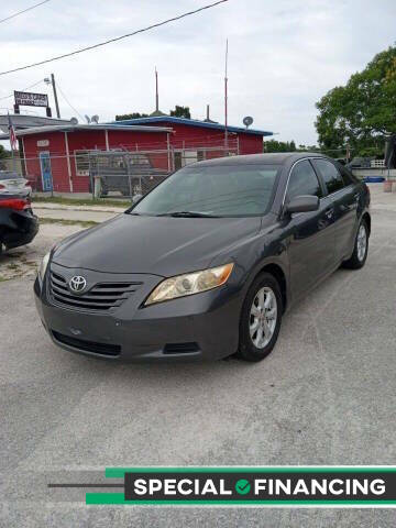 2009 Toyota Camry for sale at Megs Cars LLC in Fort Pierce FL