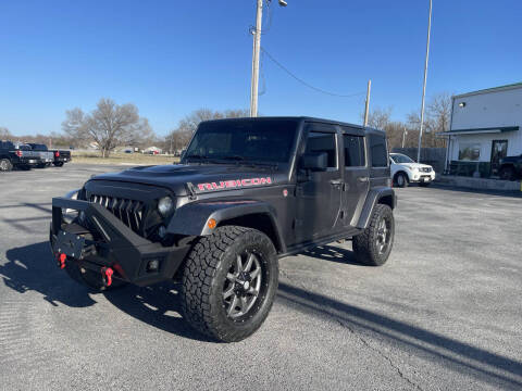 2014 Jeep Wrangler Unlimited for sale at GearHead Auto Sales in Webb City MO