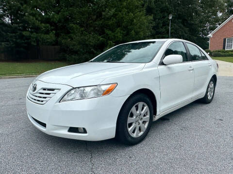 2007 Toyota Camry for sale at SHURE AUTO SALES in Snellville GA