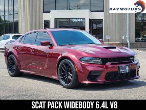2021 Dodge Charger for sale at RAVMOTORS - CRYSTAL in Crystal MN