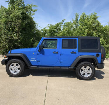 2011 Jeep Wrangler Unlimited for sale at MEDINA WHOLESALE LLC in Wadsworth OH