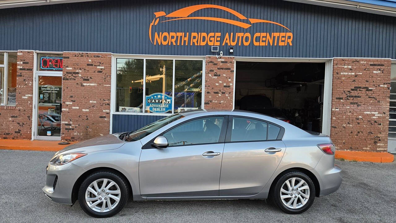 2012 Mazda Mazda3 for sale at North Ridge Auto Center LLC in Madison, OH