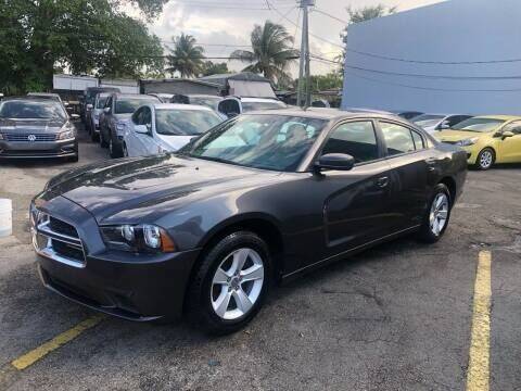 2013 Dodge Charger for sale at United Quest Auto Inc in Hialeah FL