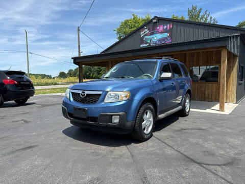 2009 Mazda Tribute for sale at Best Buy Auto Sales in Midland OH