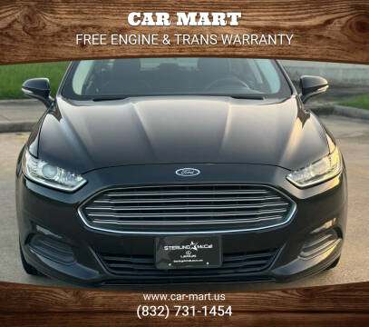 2014 Ford Fusion for sale at CAR MART in Houston TX