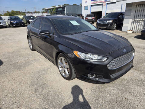 2013 Ford Fusion for sale at Icon Auto Sales in Houston TX