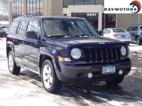 2011 Jeep Patriot for sale at RAVMOTORS - CRYSTAL in Crystal MN