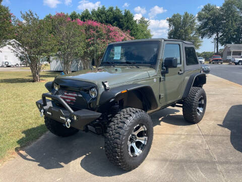 2015 Jeep Wrangler for sale at Getsinger's Used Cars in Anderson SC