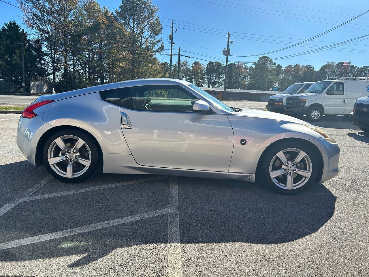 2009 Nissan 370Z for sale at Justin Hughes Auto Group LLC in Douglasville, GA