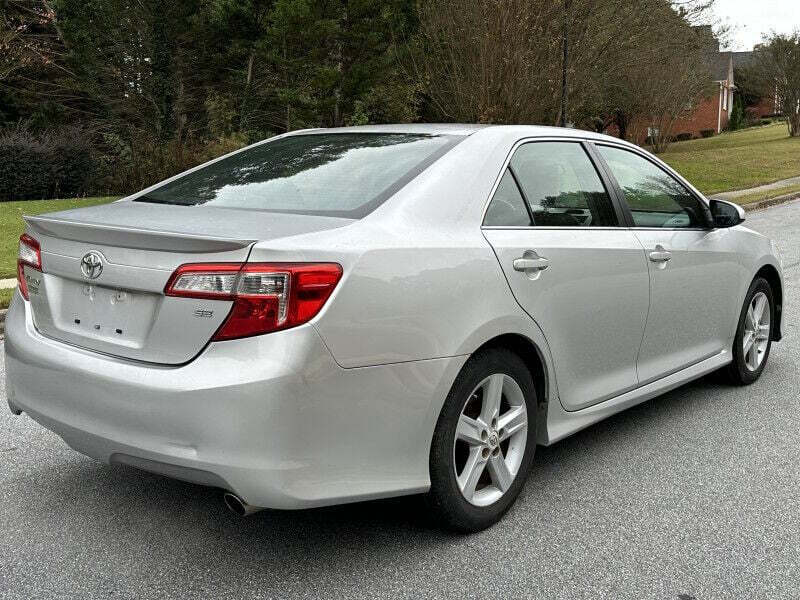 2012 Toyota Camry for sale at SHURE AUTO SALES in Snellville, GA