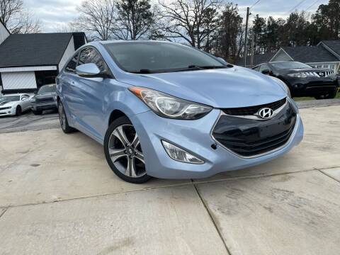 2013 Hyundai Elantra Coupe for sale at Alpha Car Land LLC in Snellville GA