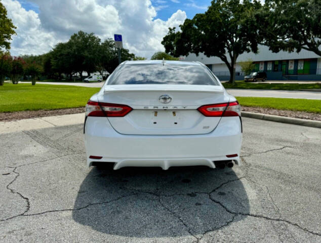 2020 Toyota Camry for sale at Zoom Auto Exchange LLC in Orlando, FL