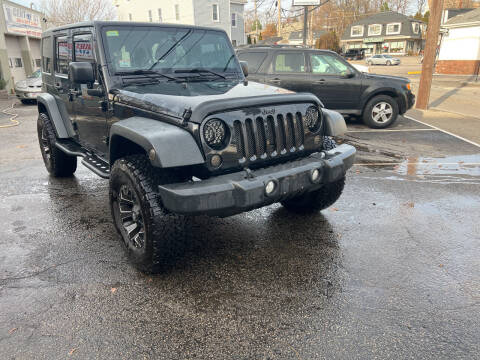 2013 Jeep Wrangler Unlimited for sale at Charlie's Auto Sales in Quincy MA