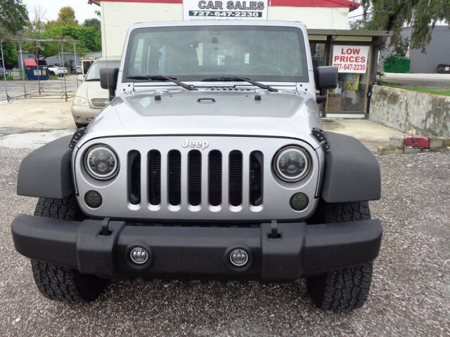 2013 Jeep Wrangler for sale at EAST LAKE TRUCK & CAR SALES in Holiday, FL