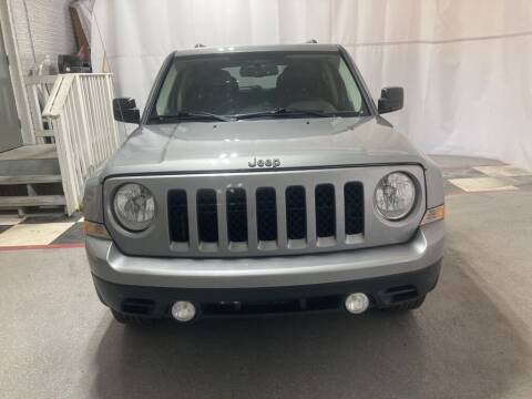 2015 Jeep Patriot for sale at Tradewind Car Co in Muskegon MI