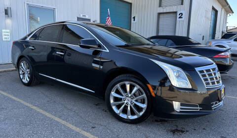 2013 Cadillac XTS for sale at Rockstone Automotive Inc in Monticello MN
