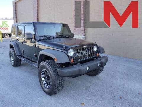 2011 Jeep Wrangler Unlimited for sale at INDY LUXURY MOTORSPORTS in Fishers IN