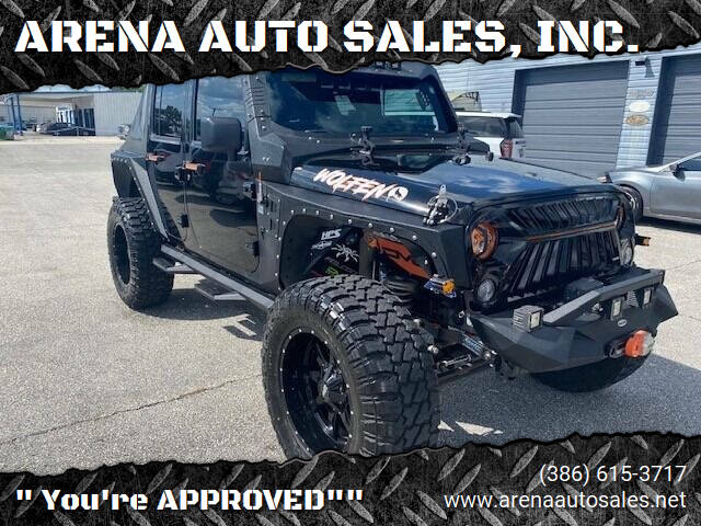 2017 Jeep Wrangler Unlimited for sale at ARENA AUTO SALES,  INC. in Holly Hill FL