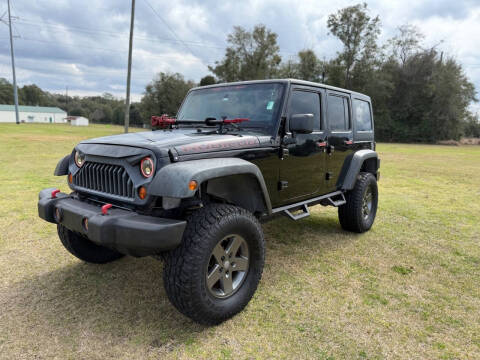 2011 Jeep Wrangler Unlimited for sale at SELECT AUTO SALES in Mobile AL