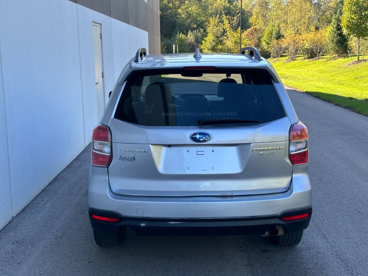 2016 Subaru Forester for sale at Phoenix Motor Co in Romulus, MI